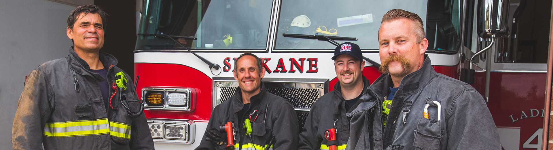 4 fire fighters returning from a run